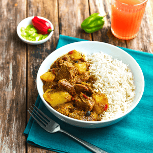 Jamaican Food Near Me. Curry Goat with Plain Rice Delivery UK. Frozen Ready Meals
